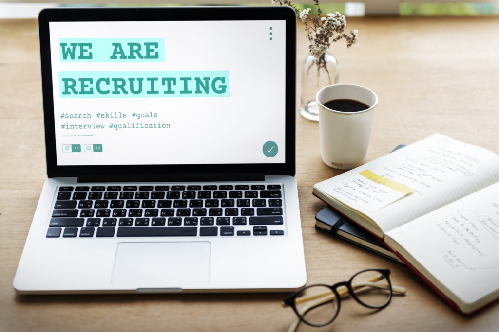 an open laptop display Feature Image For: How to Post on Multiple Job Boards with One Click